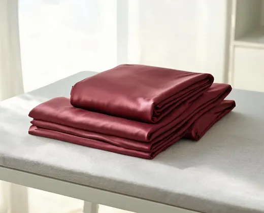 Seamless silk sheets folded for inspection